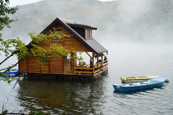 House on Lake Perucac, Serbia in the fog