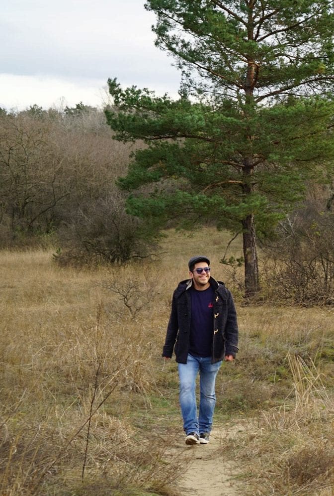 Miguel walking in Serbia's countryside