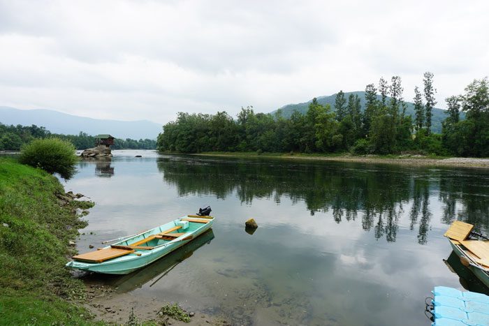 Boats by house on the Drina